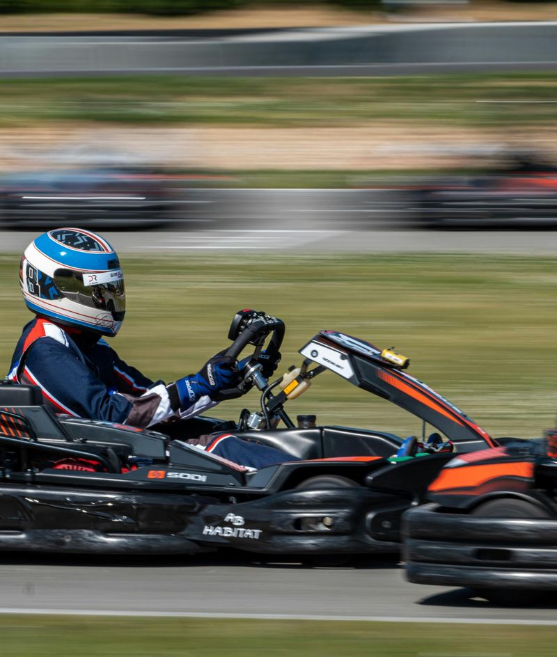 Hire karts racing past the pits at Stony Creek